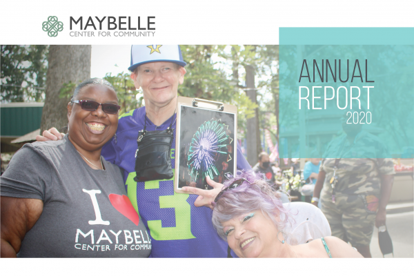 Front cover of our annual report with three people embracing